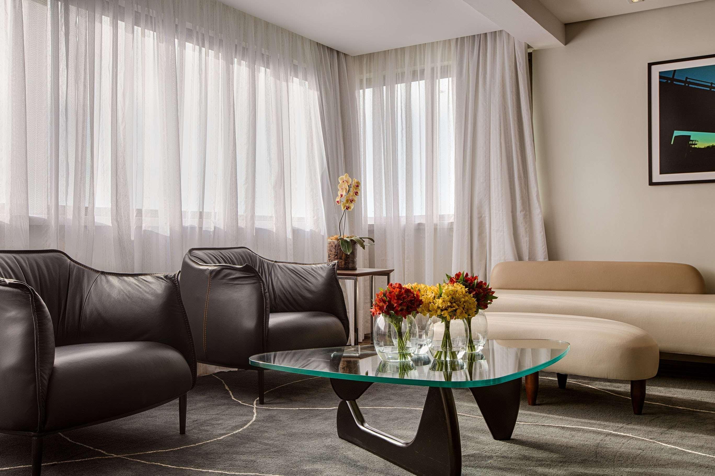 Radisson Porto Alegre - Futuro Hotel Epic People&Arts Esterno foto A living room at the hotel